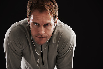 Image showing Portrait, tired and man with fitness, breathing and healthy athlete on a dark studio background. Face, person and model with wellness and exhausted with burnout and fatigue with exercise and workout