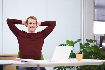 Image showing Smile, relax and portrait of businessman in office for finish project on laptop with deadline. Happy, rest and male creative designer with hands on head for completed work on computer in workplace.