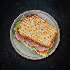 Image showing Toasted ham and cheese sandwich