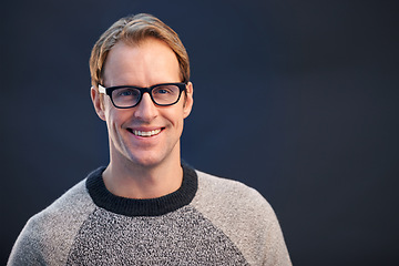 Image showing Portrait, glasses and man with smile, optometry and confident guy on a dark studio background. Face, person and model with eyewear and clear vision with healthy eyesight and looking with wellness