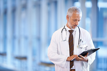 Image showing Checklist, serious doctor and man reading in hospital for healthcare, wellness and notes. Clipboard, medical professional and mature surgeon with paperwork, results and report on chart in clinic