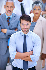 Image showing Portrait, leadership and business people with confident man, pride and solidarity in startup career. Community, professional men and women together in office for group, arms crossed and teamwork