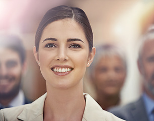 Image showing Business, leadership and happy woman with group in office for collaboration, teamwork or support. Face, smile or female lawyer with paralegal team at law firm for startup, about us or career goals