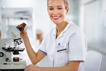 Image showing Smile, microscope or portrait of scientist or woman in laboratory for research, medical analysis or test. Proud, investigation or happy science expert with solution for future development or results