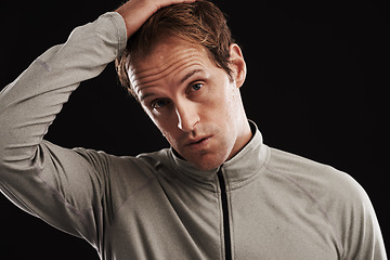 Image showing Portrait, tired and man with fitness, fatigue and healthy athlete on a dark studio background. Face, person and model with confidence and exhausted with burnout and breathing with exercise or workout