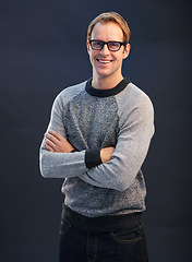 Image showing Happy, nerd and portrait of man in studio with arms crossed and pride on dark background. Confident, programmer and person with a smile in development of solution for IT project in mockup space