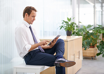 Image showing Scroll, relax and man in office with tablet, sales review or profit report at online consulting agency. Internet, business growth or development with businessman on digital app search for budget plan