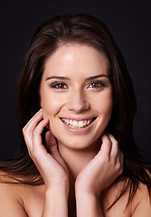 Image showing Face, smile and woman in portrait for beauty, hair care and wellness with glow isolated on dark background. Portrait, happiness with natural or clean look makeup, salon treatment and skin in studio