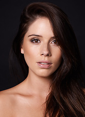 Image showing Makeup, portrait and woman in studio for cosmetic wellness, shine or natural results on black background. Beauty, face and calm female model with cosmetic shine, treatment or glowing skin confidence