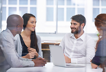 Image showing Business people, boardroom and meeting partnership for startup planning for tech b2b support, collaboration or problem solving. Men, women and laptop in office building for deal, sales or decision