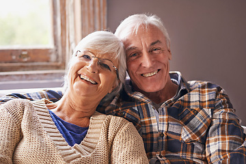 Image showing Senior couple, smile and portrait in sofa with hug, love and connection in living room for retirement. Elderly woman, old man and embrace on lounge lounge with pride, care and happy in apartment