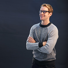 Image showing Man, thinking and happy nerd in studio with arms crossed and inspiration on dark background. Planning, ideas and computer systems analyst with development of solution for IT project update in mockup