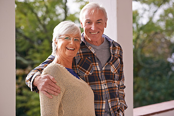 Image showing Couple, senior and portrait with hug, balcony and home for happy retirement. Mature man, woman and marriage with elderly, care and love for healthy relationship and romantic rest and relaxation