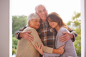 Image showing Outdoor, portrait and old man hug family on patio of home, smile and happiness from wife and daughter. House, adult and male person embrace women with love for visit of girl, parents and retirement