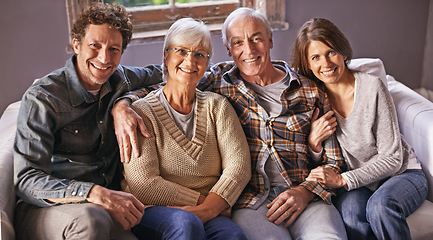 Image showing Couple, senior parents and portrait on couch with smile, hug and care with bonding, relax and pride in home. Father, mother and happy with women, men and embrace with love on sofa in family house