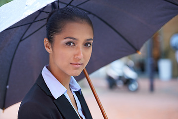 Image showing Umbrella, travel or businesswoman in portrait or city for legal justice, commute and pride with protection. Outdoor, lawyer or face of female attorney, advocate or insurance advisor at courthouse