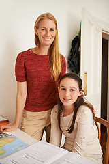 Image showing Study, portrait and mother help daughter with smile for child, growth and development with education. Parent, woman and mom with support for girl, book and map on table for geography homework