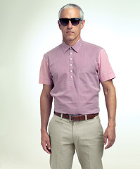 Image showing Mature man, confident or trendy as fashion, apparel or stylish outfit in studio on white background. Assertive, businessman or sunglasses as smart, casual or leisure wear to relax on getaway