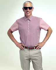 Image showing Confident, happy or businessman in leisure, fashion or stylish look as smart, casual or clothing. Hands on hips, man or smile in sunglasses as trendy outfit or apparel in studio on white background