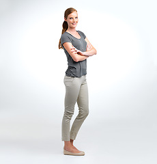 Image showing Woman, portrait and confident in studio with smile, fashion and creative style in mockup. Female person, happy and pride in white background with arms crossed, entrepreneur and career for startup