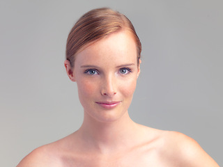 Image showing Portrait, beauty and skincare of woman in makeup for glow, shine or health in studio isolated on a white background. Face, ginger model and young person with cosmetics or treatment for dermatology