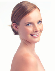 Image showing Portrait, natural beauty and skincare of happy woman for glow, shine or health in studio isolated on a white background. Face, smile and ginger model with freckles, cosmetics and facial dermatology