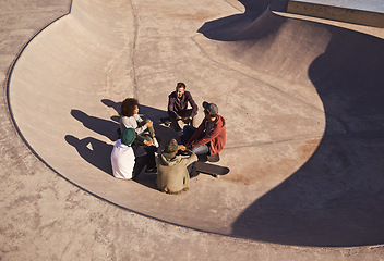 Image showing Sunshine, skate park and friends with conversation, relax and communication with weekend break or group. People, outdoor or skaters with summer or recreation with diversity or support with discussion