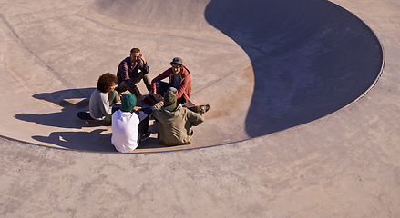 Image showing Group, skate park and friends with conversation, relax and sunshine with weekend break and team. People, outdoor and skaters with summer and recreation with diversity and support with discussion