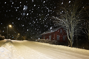 Image showing snowy street of the small town of Pernio in Finland at night 