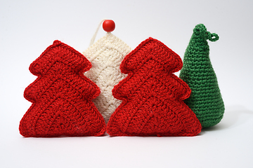 Image showing A group of knitted christmas trees