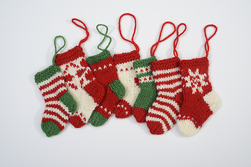 Image showing Cozy family tradition captured in handcrafted holiday stockings