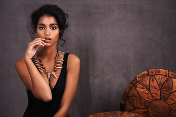 Image showing Indian woman, confident and fashion in studio with jewelry on grey background with beauty and style. Portrait, female person and makeup with traditional necklaces, outfit and heritage look.