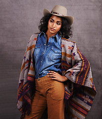 Image showing Culture, cowgirl or woman thinking in studio, wild west and cool fashion or clothing on grey background. Native American person, western lady and stylish model with pride, boho style and confidence