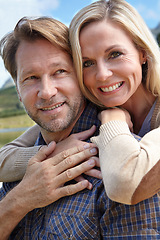 Image showing Embrace, love and portrait of couple in nature in summer for vacation, holiday and bonding at countryside. Man, woman and smile with happiness weekend adventure, travel and tourism in Australia