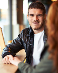 Image showing Man, woman and cafe date with love, hand holding for couple and romantic affection. Boyfriend, support together for bonding relationship, female person at table for trust comfort and compassion