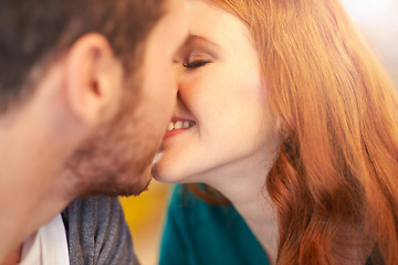 Image showing Couple, date and kiss with romance, smiling and smooch with happiness together. Man, woman and partner for relationship, love and care or flirting on break for relax with bonding on honeymoon