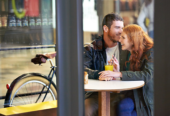 Image showing Laugh, happy and couple in cafe for care on date for relationship anniversary with commitment, support and trust. Man, woman and in love together, hand holding and affection in restaurant for bonding
