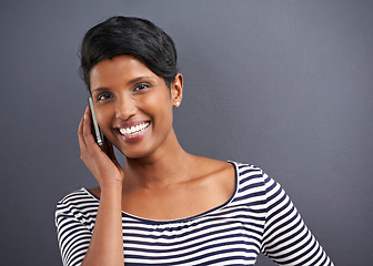 Image showing Woman, portrait and phone call with confidence of a creative employee with grey background ready for work. Job, inspiration and happy Indian female worker with wondering and networking with style