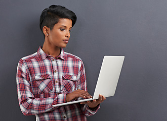 Image showing App, social media and internet for woman with laptop for online, web and info on weekend or indoor. Blogger or content creator and typing on keyboard for engagement, tech and browse on mockup