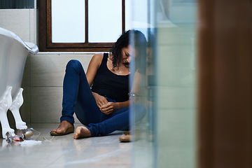 Image showing Woman, drug addict and sleep in bathroom for addiction or withdrawal symptoms, depression and mental health. Person or user, overdose and glass of alcoholic for substance abuse for feeling of stress.