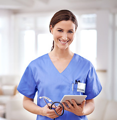 Image showing Portrait, tablet and doctor woman in scrubs for medical, results, information or health insurance. Hospital, lens flare and female professional with technology for smile, care and support in clinic