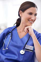 Image showing Thinking, nurse and happy woman in hospital for medicine, healthcare or wellness of person. Vision, medical professional and smile of surgeon, employee or expert doctor planning future in clinic