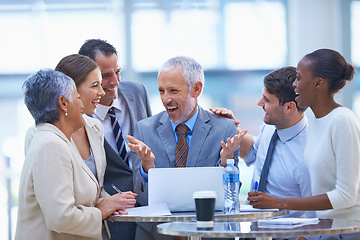 Image showing Meeting, laptop and excited business people in celebration for good news, promotion and winning. Corporate, collaboration and happy men and women on computer for internet, website and online success