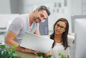 Image showing Business people, laptop and teamwork with conversation, planning or PR consultant with agency. Staff, man or woman with computer or online reading for company blog or news with feedback or web design