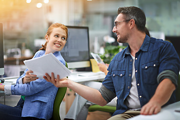 Image showing Business people, paperwork and teamwork with conversation, solution or cooperation with problem solving. Journalist, magazine or man with woman or documents and editor with planning, report or review