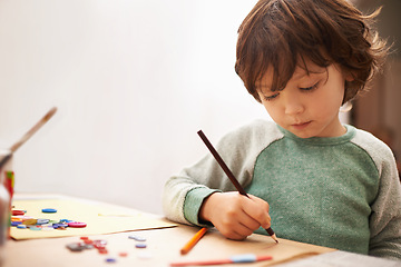 Image showing Little boy, drawing and writing with pencil for art, craft or color in learning creativity or education at home. Young child for sketching, artwork or creative imagination in childhood development