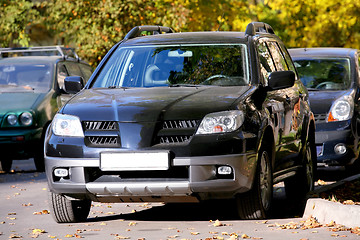 Image showing Black Japanese Jeep on Open-Air