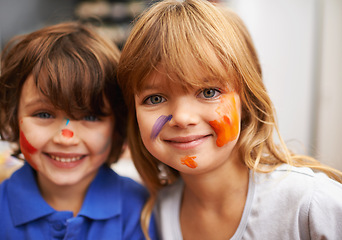 Image showing Happy children, portrait and face paint with color for artwork, craft or creativity at elementary school. Little girl, boy or kids with smile for colorful art, youth or early childhood development