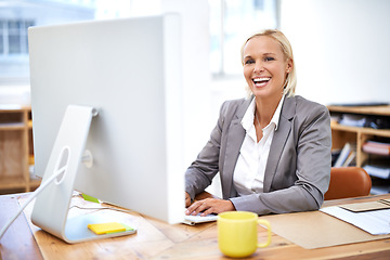 Image showing Lawyer, woman and portrait by computer with smile for legal services with pride, knowledge and typing. Attorney, advocate and person by office pc for writing, excited and happy at law firm in Canada
