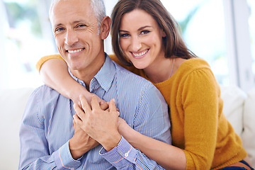 Image showing Happy, couple and hug in portrait, love with unique relationship and support for trust at home. Aged man, young woman and age difference in marriage, commitment and loyalty with pride together